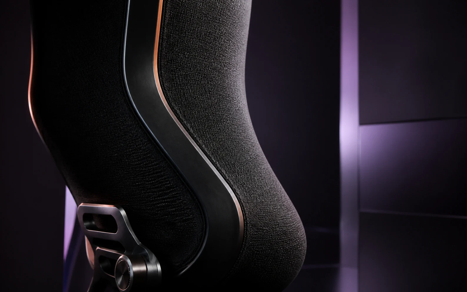 Concept close-up of a black mesh chair backrest and sculpted outer frame